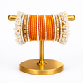 Premium Orange Pearl Bangle Set | Designer Chooriyan with White Pearls & Golden Borders