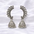 Intricately designed silver jhumka earrings