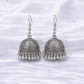 Antique silver jhumka earrings on satin