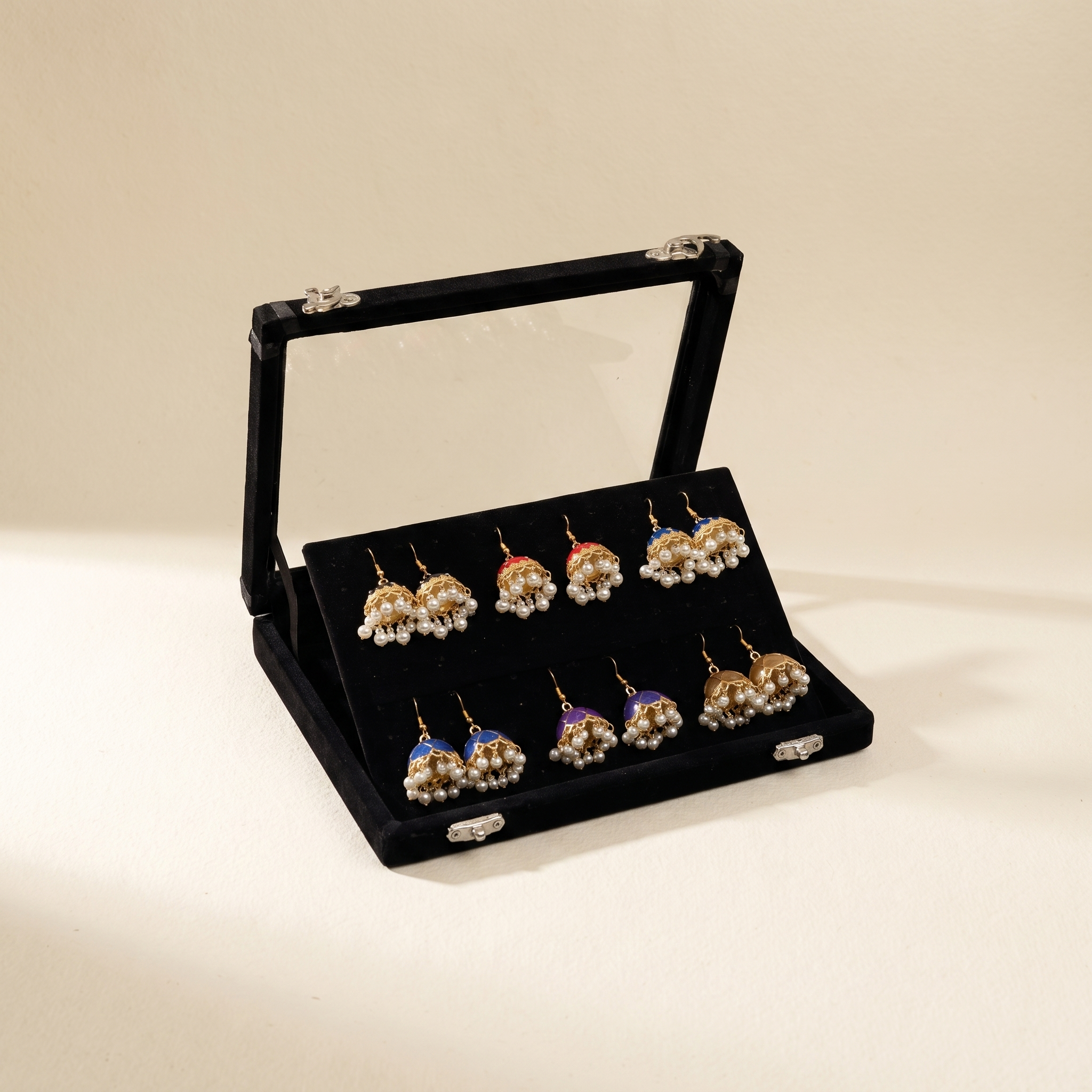 6 pair colorful pearl jhumka earrings display box on warm ivory paper
