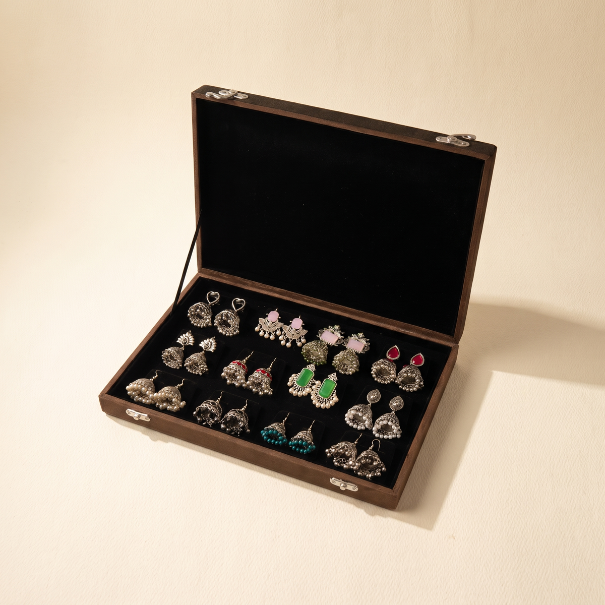 Premium jhumka box on warm ivory paper