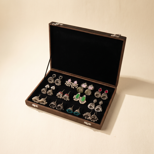 Premium jhumka box on warm ivory paper